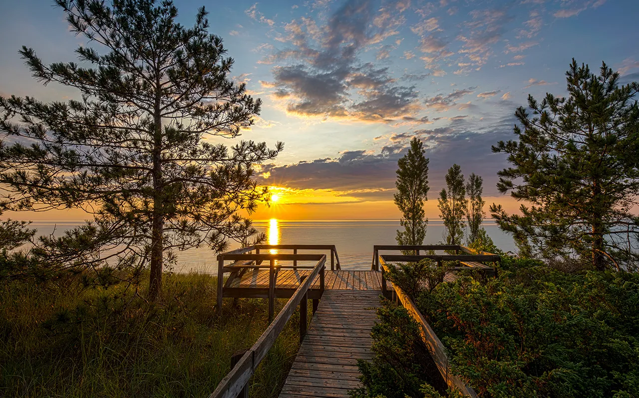 Boardwalk to the Lake Huron beach at sunset near Grand Bend, Ontario